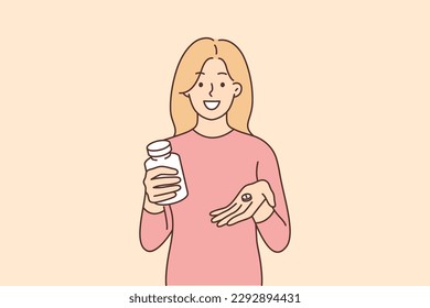 Woman is holding pack of vitamins and capsule of medicine that relieves headache or relieves depressive mood. Happy girl offers to take healthy vitamins and dietary supplements or painkillers 