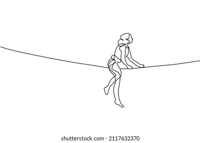 woman holding a rope and running on a rope