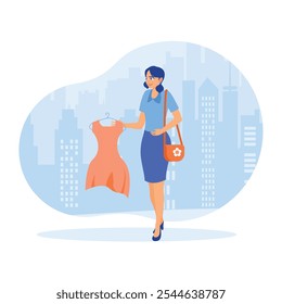 A woman holding a shirt. Young woman shopping for clothes. Family lifestyle activity concept. Flat vector illustration.