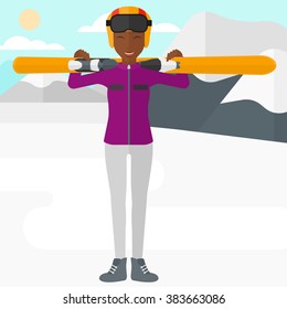 Woman holding skis.