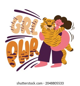 Woman  holding a tiger in her arms the symbol of the new 2022. Strong woman and big wild cat. Girl power