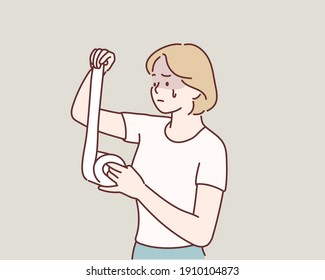 woman holding toilet paper roll. Hand drawn style vector design illustrations.