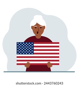 A woman is holding a US flag. The concept of demonstration, national holiday, independence day or patriotism. Nationality.