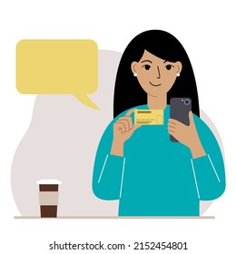 A woman holds a bank card in her hand. Concept of credit, deposit, payment, debit online. Place for the test