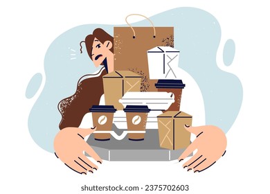 Woman holds boxes and bags for take-out food working as delivery courier at fastfood restaurant. Courier girl with embarrassed emotions showing paper containers for pizza and hamburgers or coffee mugs