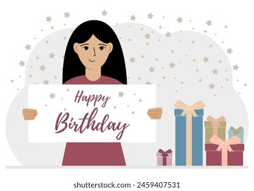 A woman holds a card with a happy birthday in his hands.