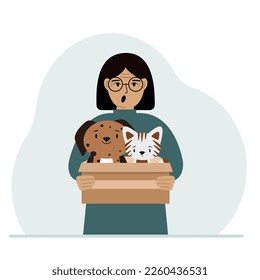 A woman holds a cardboard box with a cat and a dog. The concept of rescue, help and care for pets. Vector flat illustration