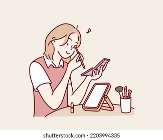 woman holds a colorful eyeshadow palette and using a make-up brush, applies eye shadow to upper eyelid. Hand drawn style vector design illustrations.