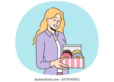 Woman holds donuts in box offering breakfast with sweet pastries with fruit or chocolate icing. Happy girl with donuts for kids party with desserts delivered from patisserie or bought in coffee shop