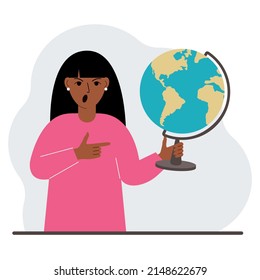 A woman holds a globe in his hand and points his finger at it. The concept of education, teacher, world conquest, ecology. Vector flat illustration