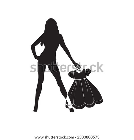 A woman holds in her hand a light dress on a coat hanger