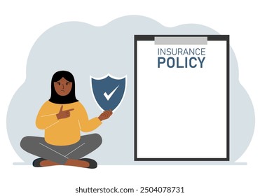 A woman holds an insurance policy sign in his hands. The concept of life insurance, property or natural disasters.