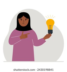A woman holds a light bulb in his hand. Idea concept, brainstorming, business, thinking, solution, eureka, task, bingo or answer search.