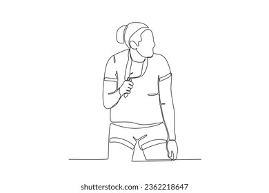A woman holds a medal around her neck. Spain's women's football team victory