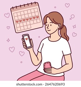 Woman holds a menstrual cup and mobile phone while standing near calendar. She tracks her cycle and chooses sustainable hygiene