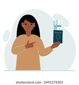 A woman holds a passport with air tickets. The woman shows the boarding pass. Travel concept.