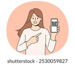 Woman holds phone demonstrating QR code for exchanging contacts or confirming online money transfer. Young long-haired girl with smartphone recommends using QR technology in mobile gadgets