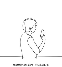 woman holds the phone in front of her vertically and looks at it - one line drawing. concept of taking a photo, looking for a communication signal, mobile video filming, call video communication
