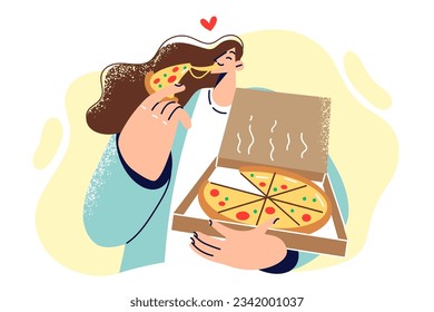 Woman holds pizza box and bites into piece of italian snack from fast food restaurant. Young girl used pizza delivery service from pizzeria and enjoys delicious high-calorie lunch.