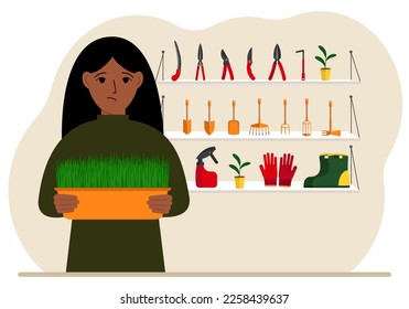 A woman holds a plant in his hands against the background of gardening tools. Gardening concept. Vector flat illustration.