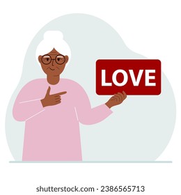 A woman holds a red banner with the text love. The concept of valentine's day, holiday or psychological help.