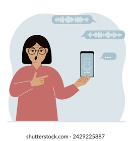 A woman holds a smartphone using a voice assistant application. Voice recognition concept. Smart speaker applications, office controller, hands-free phone calls, voice command software.