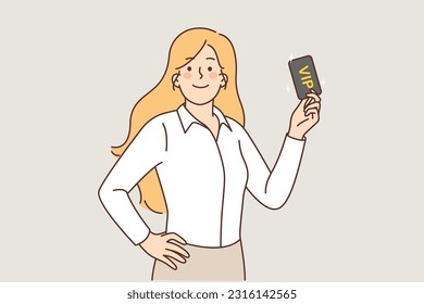 Woman holds vip card for access to private club of interest or party of people with premium status. Happy girl with vip card looks at camera offering to purchase coupon giving right to privileges