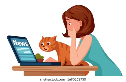 woman at home with a cat watches  news on the laptop with fear and surprise