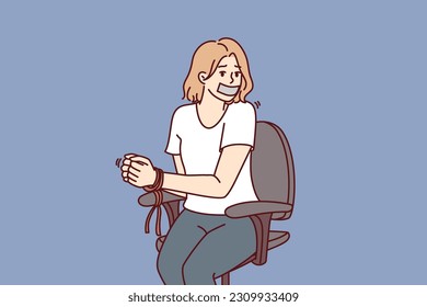 Woman hostage with bound hands sits in chair after being kidnapped or attacked by criminals. Girl with sealed mouth became hostage during attack by robbers on company office or bank branch
