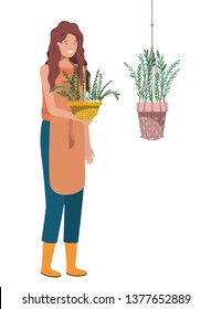 woman with houseplant on macrame hangers