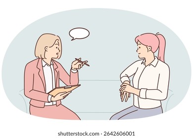Woman HR manager asks questions to candidate who wants to become member of team of professionals. HR manager conducts interviews selecting highly qualified employees to make them job offer