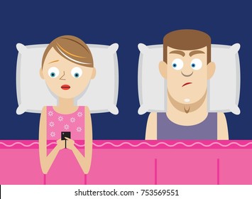 Woman ignoring husband while using phone in bed