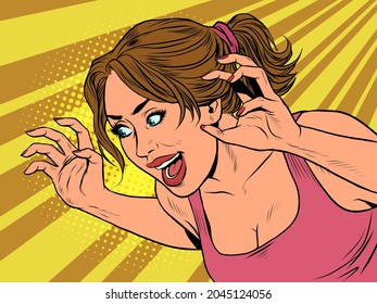 a woman is jokingly scaring, halloween pose. Emotions and fear