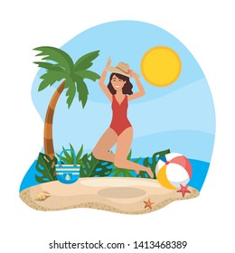 woman jumping with hat and wearing swimsuit with ball in the beach