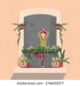 Woman keep distance and practice yoga on Balcony. Girl stay home during quarantine and make asana. Good workout with open window for healthy life. Physical exercise on Terrace with houseplant.