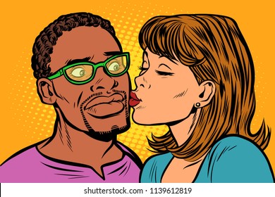 woman kisses a man. multi-ethnic couple. embarrassment. Pop art retro vector illustration kitsch vintage drawing