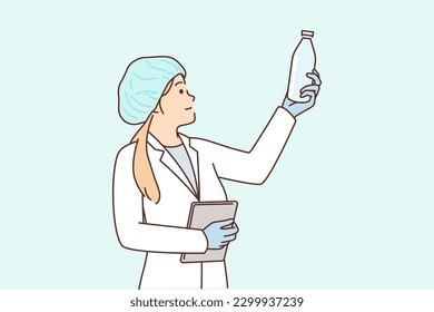 Woman laboratory assistant with glass bottle checks chemical composition of milk produced in factory. Professional girl performs quality control working as technologist at food factory.