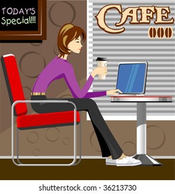 Woman with laptop in coffee shop