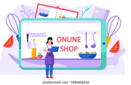 Woman with a laptop in her hands standing and working on her computer. Online shopping for food for cooking. Culinary store on the Internet. Video recording of a culinary blog. Online cooking