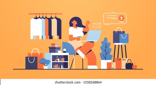 woman with laptop using computer application online shopping concept big fashion shop female clothes boutique interior flat full length horizontal vector illustration
