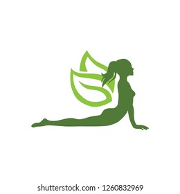 woman with leaves wings practicing yoga. logo icon 