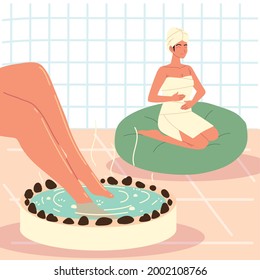 piernas femeninas en el spa de relajación acuática