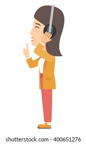 Woman listening music in headphones 