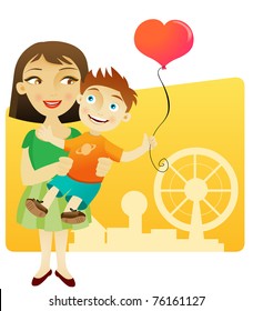 Woman and little boy having fun in the park with a balloon