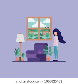 woman in the living room with houseplants and lamp