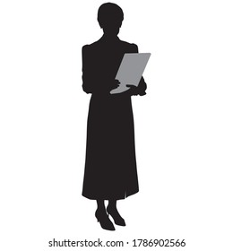 woman in long dress and shoes is standing on white background