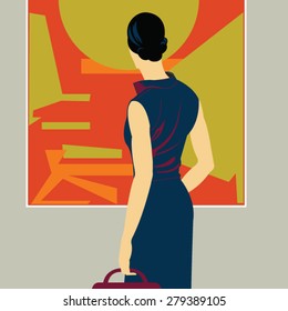 Woman looking at abstract art in gallery