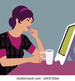 Woman looking at computer screen
