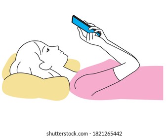 A woman looking up at her smartphone while sleeping