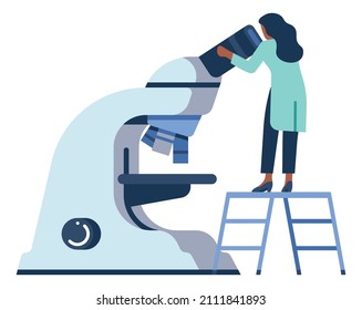 Woman looking at microscope. Laboratory worker doing research